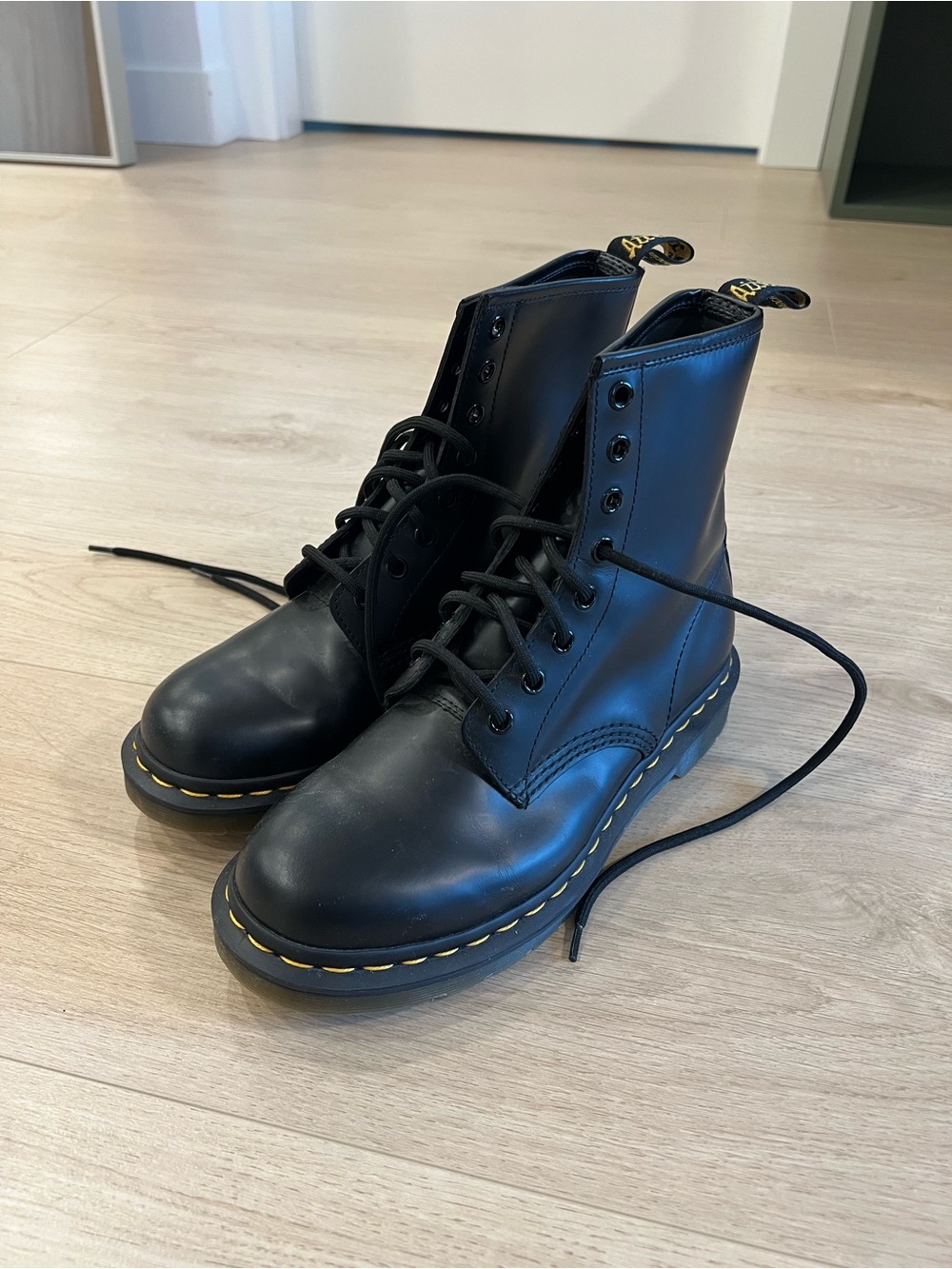 Dr. Martens Black Leather 8-Eye Boots with Yellow Stitching